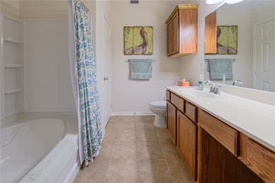 Discover true coastal comfort in this charming 2-bedroom, 2-bath on Rockport Country Club in Texas - for sale on GolfHomes.com, golf home, golf lot