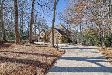 This custom brick home is an entertainer's dream with a private on Dunwoody Country Club in Georgia - for sale on GolfHomes.com, golf home, golf lot