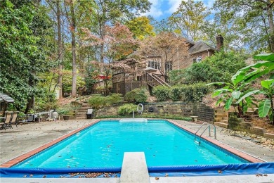 This custom brick home is an entertainer's dream with a private on Dunwoody Country Club in Georgia - for sale on GolfHomes.com, golf home, golf lot