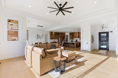 As you are welcomed into your tucked-in private entry courtyard on The Ledges Golf Club in Utah - for sale on GolfHomes.com, golf home, golf lot