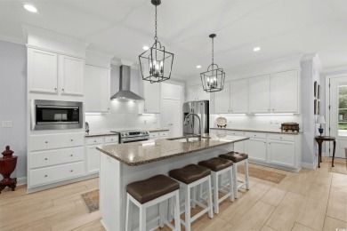 This beautifully maintained 1.5-story home, built in 2019 by on Tidewater Golf Club and Plantation in South Carolina - for sale on GolfHomes.com, golf home, golf lot
