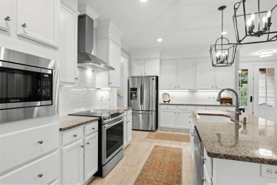 This beautifully maintained 1.5-story home, built in 2019 by on Tidewater Golf Club and Plantation in South Carolina - for sale on GolfHomes.com, golf home, golf lot