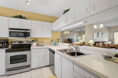 Welcome to this charming 2BR/2BA first-floor condo, offering the on Peridia Golf and Country Club in Florida - for sale on GolfHomes.com, golf home, golf lot