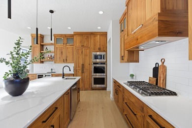 As you are welcomed into your tucked-in private entry courtyard on The Ledges Golf Club in Utah - for sale on GolfHomes.com, golf home, golf lot