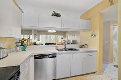 Welcome to this charming 2BR/2BA first-floor condo, offering the on Peridia Golf and Country Club in Florida - for sale on GolfHomes.com, golf home, golf lot