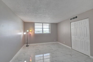 East Boca. 30-year inspection just passed. Totally updated on Ocean Breeze Golf and Country Club in Florida - for sale on GolfHomes.com, golf home, golf lot