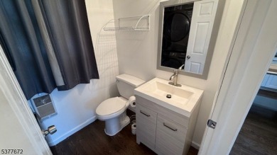 Relax in this updated end-unit, lakefront townhome offering a on High Point Golf Club in New Jersey - for sale on GolfHomes.com, golf home, golf lot