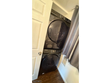 Relax in this updated end-unit, lakefront townhome offering a on High Point Golf Club in New Jersey - for sale on GolfHomes.com, golf home, golf lot