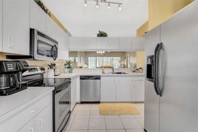 Welcome to this charming 2BR/2BA first-floor condo, offering the on Peridia Golf and Country Club in Florida - for sale on GolfHomes.com, golf home, golf lot