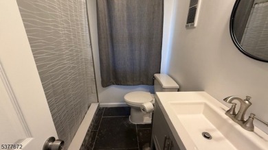 Relax in this updated end-unit, lakefront townhome offering a on High Point Golf Club in New Jersey - for sale on GolfHomes.com, golf home, golf lot