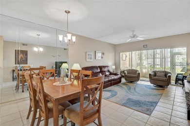 Welcome to this charming 2BR/2BA first-floor condo, offering the on Peridia Golf and Country Club in Florida - for sale on GolfHomes.com, golf home, golf lot