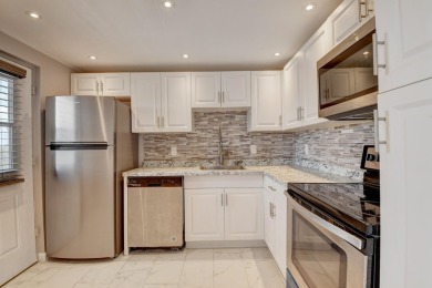 East Boca. 30-year inspection just passed. Totally updated on Ocean Breeze Golf and Country Club in Florida - for sale on GolfHomes.com, golf home, golf lot