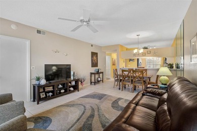 Welcome to this charming 2BR/2BA first-floor condo, offering the on Peridia Golf and Country Club in Florida - for sale on GolfHomes.com, golf home, golf lot