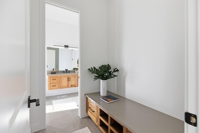 As you are welcomed into your tucked-in private entry courtyard on The Ledges Golf Club in Utah - for sale on GolfHomes.com, golf home, golf lot