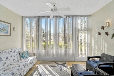 Welcome to this charming 2BR/2BA first-floor condo, offering the on Peridia Golf and Country Club in Florida - for sale on GolfHomes.com, golf home, golf lot