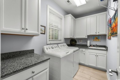 This beautifully maintained 1.5-story home, built in 2019 by on Tidewater Golf Club and Plantation in South Carolina - for sale on GolfHomes.com, golf home, golf lot