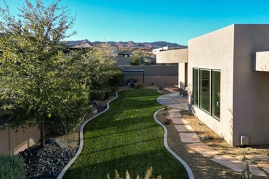As you are welcomed into your tucked-in private entry courtyard on The Ledges Golf Club in Utah - for sale on GolfHomes.com, golf home, golf lot