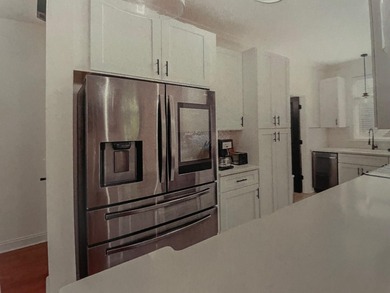 Discover this exceptional three-bedroom on The River Golf Club in South Carolina - for sale on GolfHomes.com, golf home, golf lot