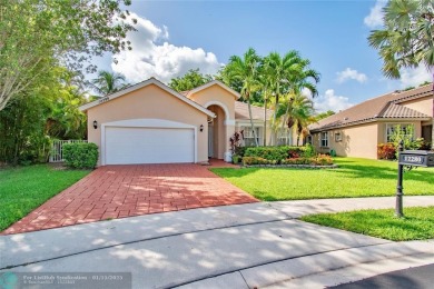 This charming single story family home is nestled in the on Osprey Point Golf Course in Florida - for sale on GolfHomes.com, golf home, golf lot