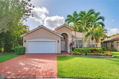 This charming single story family home is nestled in the on Osprey Point Golf Course in Florida - for sale on GolfHomes.com, golf home, golf lot