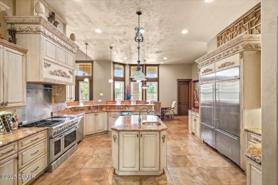 Built by Johnson Group Homes as the builder's personal custom on Venetian Bay Golf Course in Florida - for sale on GolfHomes.com, golf home, golf lot