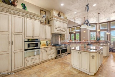 Built by Johnson Group Homes as the builder's personal custom on Venetian Bay Golf Course in Florida - for sale on GolfHomes.com, golf home, golf lot