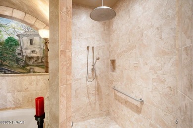 Built by Johnson Group Homes as the builder's personal custom on Venetian Bay Golf Course in Florida - for sale on GolfHomes.com, golf home, golf lot