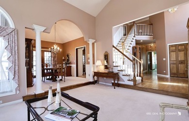 Experience this beautifully maintained custom single-family home on Stonebridge Country Club in Illinois - for sale on GolfHomes.com, golf home, golf lot