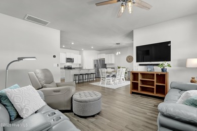 Welcome to this charming cottage with manicured landscaping on Lennon Hills Golf Course in North Carolina - for sale on GolfHomes.com, golf home, golf lot