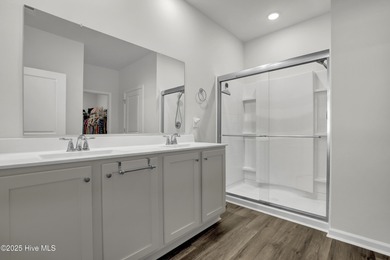 Welcome to this charming cottage with manicured landscaping on Lennon Hills Golf Course in North Carolina - for sale on GolfHomes.com, golf home, golf lot