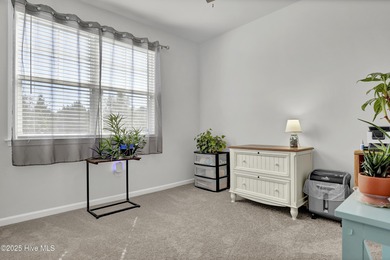 Welcome to this charming cottage with manicured landscaping on Lennon Hills Golf Course in North Carolina - for sale on GolfHomes.com, golf home, golf lot