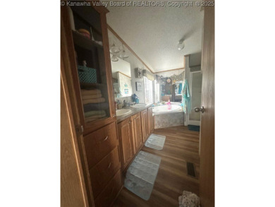 Quiet and peaceful 3 bed, 2 bath home overlooking Edgewood on Edgewood Country Club in West Virginia - for sale on GolfHomes.com, golf home, golf lot
