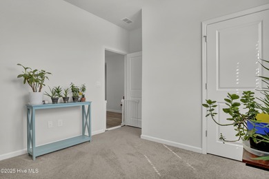 Welcome to this charming cottage with manicured landscaping on Lennon Hills Golf Course in North Carolina - for sale on GolfHomes.com, golf home, golf lot