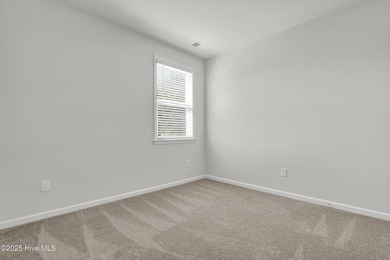 Welcome to this charming cottage with manicured landscaping on Lennon Hills Golf Course in North Carolina - for sale on GolfHomes.com, golf home, golf lot