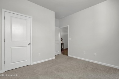 Welcome to this charming cottage with manicured landscaping on Lennon Hills Golf Course in North Carolina - for sale on GolfHomes.com, golf home, golf lot