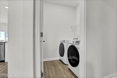 Welcome to this charming cottage with manicured landscaping on Lennon Hills Golf Course in North Carolina - for sale on GolfHomes.com, golf home, golf lot