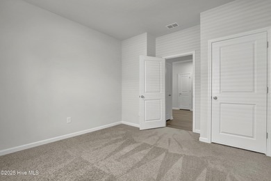 Welcome to this charming cottage with manicured landscaping on Lennon Hills Golf Course in North Carolina - for sale on GolfHomes.com, golf home, golf lot