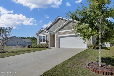 Welcome to this charming cottage with manicured landscaping on Lennon Hills Golf Course in North Carolina - for sale on GolfHomes.com, golf home, golf lot