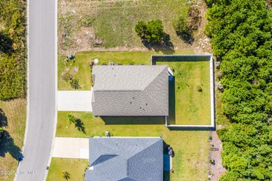 Welcome to this charming cottage with manicured landscaping on Lennon Hills Golf Course in North Carolina - for sale on GolfHomes.com, golf home, golf lot