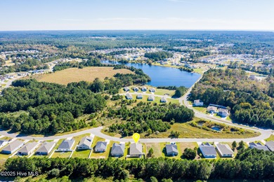 Welcome to this charming cottage with manicured landscaping on Lennon Hills Golf Course in North Carolina - for sale on GolfHomes.com, golf home, golf lot