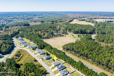 Welcome to this charming cottage with manicured landscaping on Lennon Hills Golf Course in North Carolina - for sale on GolfHomes.com, golf home, golf lot