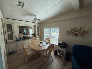 This well-cared for 2-bedroom, 2-bathroom home is being sold on Del Tura Golf and Country Club in Florida - for sale on GolfHomes.com, golf home, golf lot
