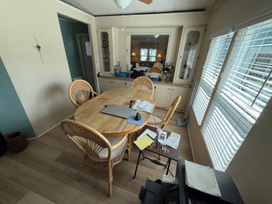 This well-cared for 2-bedroom, 2-bathroom home is being sold on Del Tura Golf and Country Club in Florida - for sale on GolfHomes.com, golf home, golf lot