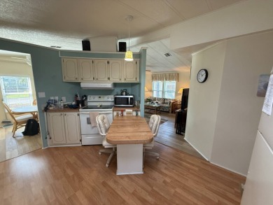 This well-cared for 2-bedroom, 2-bathroom home is being sold on Del Tura Golf and Country Club in Florida - for sale on GolfHomes.com, golf home, golf lot