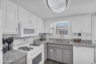 Well-Maintained Canal-Front Townhome with Spacious BackyardThis on Edgewater Beach Resort in Florida - for sale on GolfHomes.com, golf home, golf lot