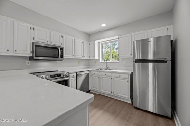 Escape to your own one-bedroom condo in a peaceful resort-style on Harbour Point Golf Club in North Carolina - for sale on GolfHomes.com, golf home, golf lot