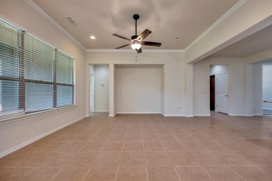 This beautifully maintained corner lot half duplex home is on Wildhorse Golf Club of Robson Ranch in Texas - for sale on GolfHomes.com, golf home, golf lot
