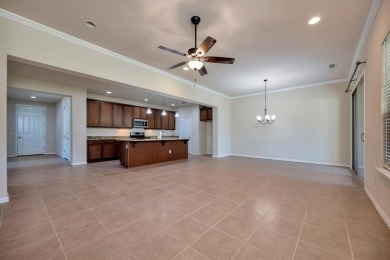 This beautifully maintained corner lot half duplex home is on Wildhorse Golf Club of Robson Ranch in Texas - for sale on GolfHomes.com, golf home, golf lot