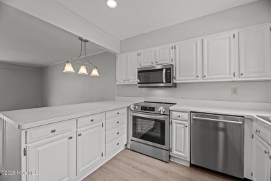 Escape to your own one-bedroom condo in a peaceful resort-style on Harbour Point Golf Club in North Carolina - for sale on GolfHomes.com, golf home, golf lot