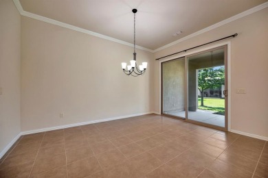 This beautifully maintained corner lot half duplex home is on Wildhorse Golf Club of Robson Ranch in Texas - for sale on GolfHomes.com, golf home, golf lot